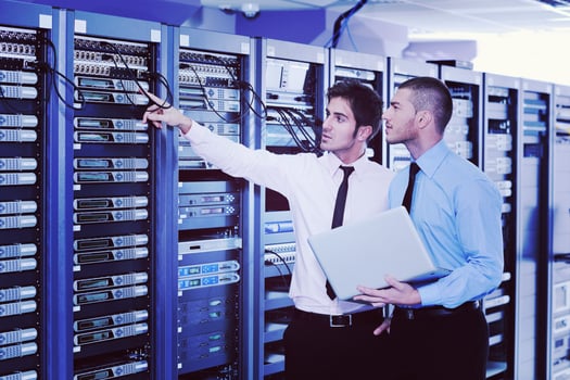 it enineers in network server room photo