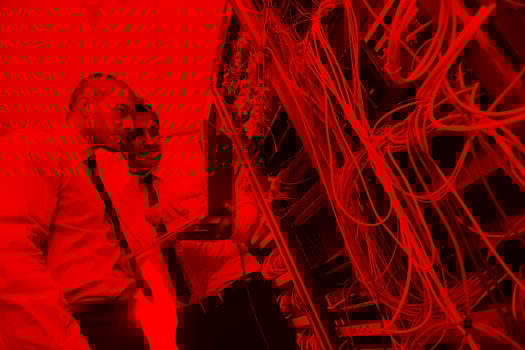 it engineers in network server room photo