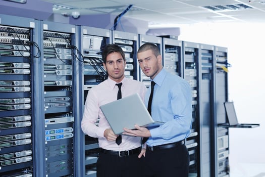 it enineers in network server room photo