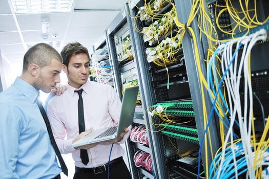 it enineers in network server room photo