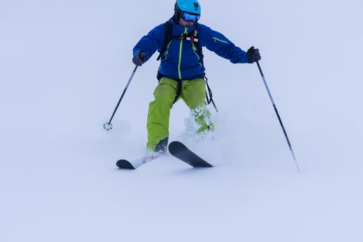 freeride skier skiing downhill photo