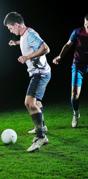 football players in competition for the ball photo