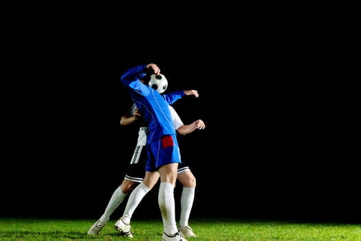 football players in action for the ball photo