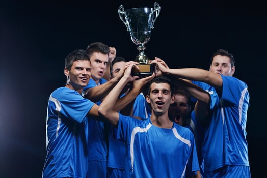 soccer players celebrating victory photo