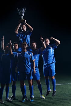 soccer players celebrating victory photo