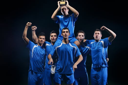 soccer players celebrating victory photo