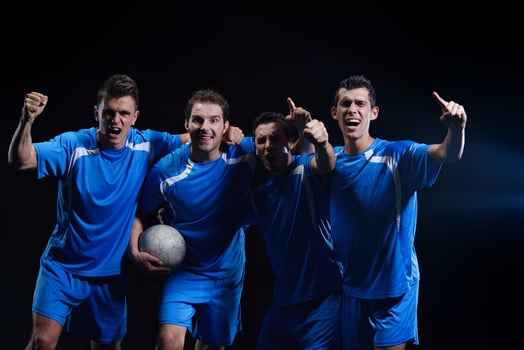soccer players celebrating victory photo