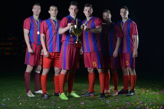 soccer players celebrating victory photo