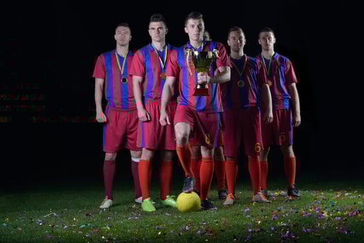 soccer players celebrating victory photo