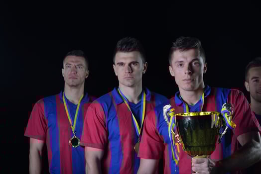 soccer players celebrating victory photo