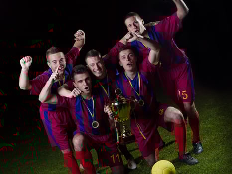 soccer players celebrating victory photo