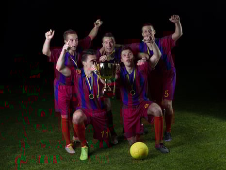 soccer players celebrating victory photo