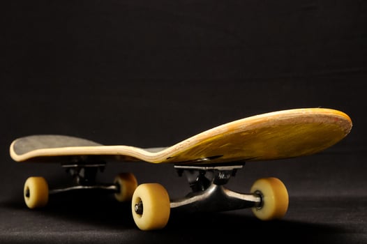 Old Used Wooden Skateboard photo