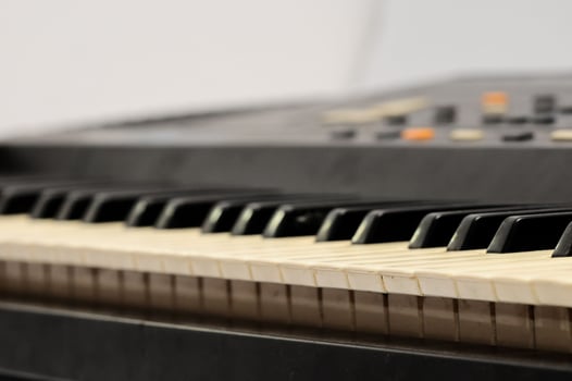 Piano keyboard closeup photo