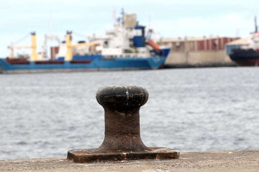 Rusty Mooring on a Pier photo