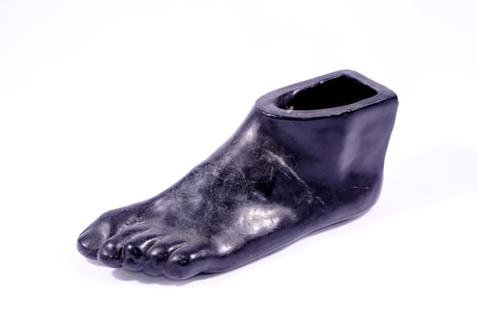 Clay Handmade Statue of a Black Foot photo