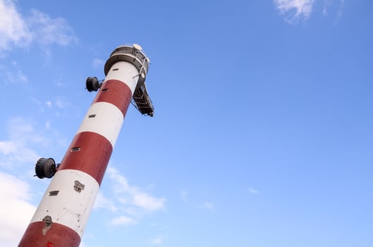 Red and White Lighthouse photo