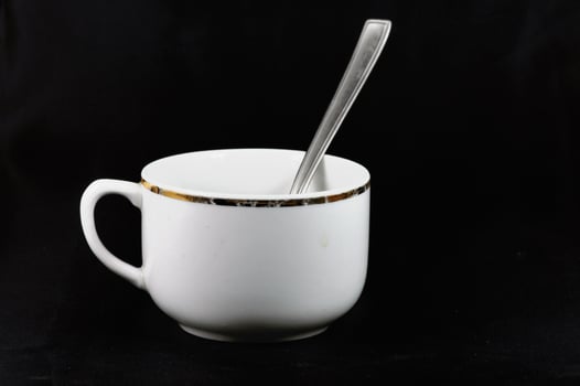 Coffee cup and spoon photo