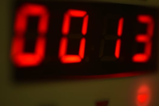 The number 13 on the electronic clock display photo