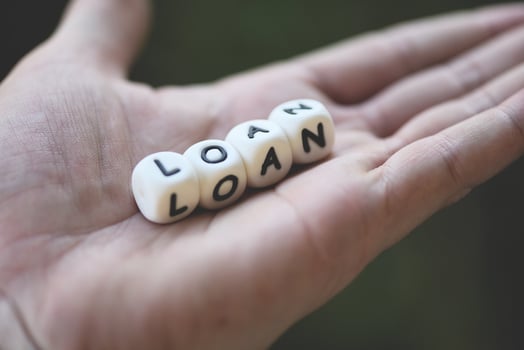 Financial loan or lending for car and home loan agreement and approval concept - word of loan in hand photo