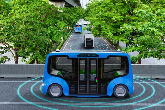 Autonomous electric shuttle bus self driving across city green road, Smart vehicle concept photo