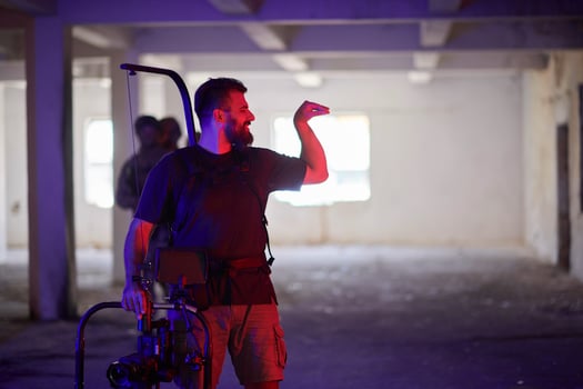 Videographer Taking Action Shoot of Soldiers in Action urban environment photo