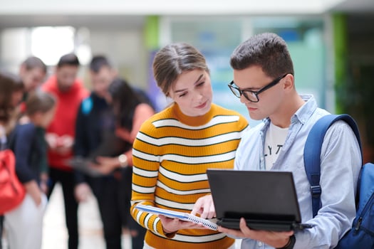 students using modern technology in school photo