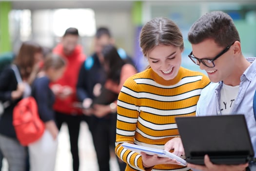 students using modern technology in school photo