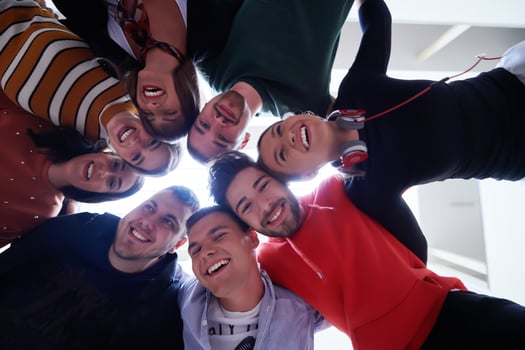 group of happy young people showing their unity photo