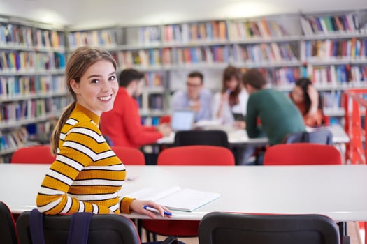 student taking notes for school class photo