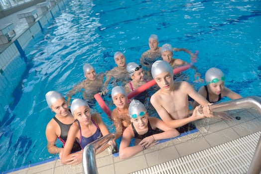 children group  at swimming pool photo