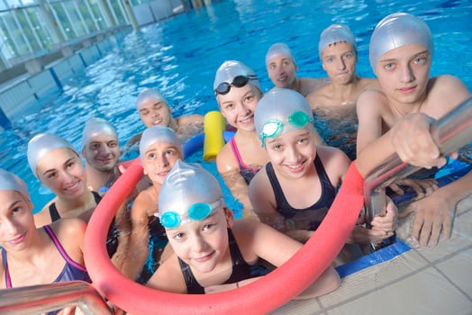 children group  at swimming pool photo