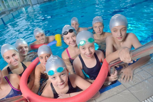 children group  at swimming pool photo