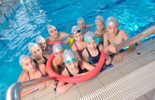 children group  at swimming pool photo