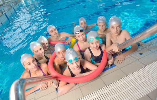 children group  at swimming pool photo