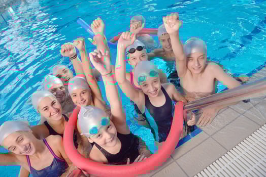 children group  at swimming pool photo