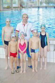 children group  at swimming pool photo