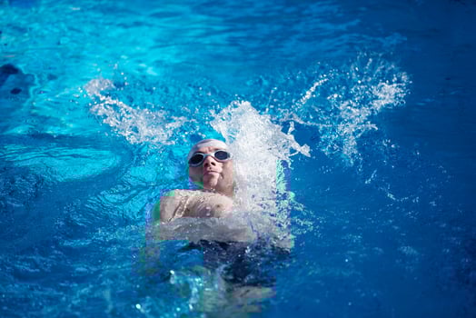 swimmer excercise on indoor swimming poo photo