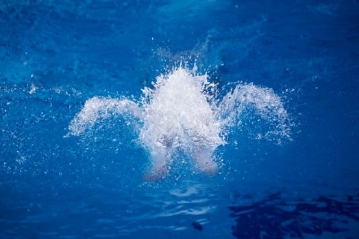 swimmer excercise on indoor swimming poo photo