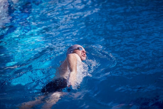 swimmer excercise on indoor swimming poo photo