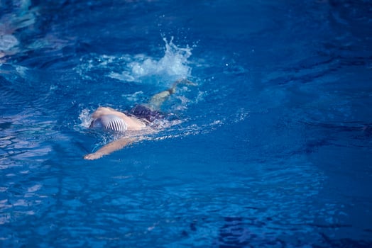 swimmer excercise on indoor swimming poo photo