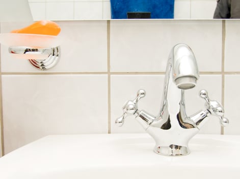 retro tap and orange soap photo
