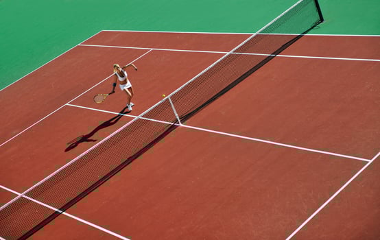 young woman play tennis photo