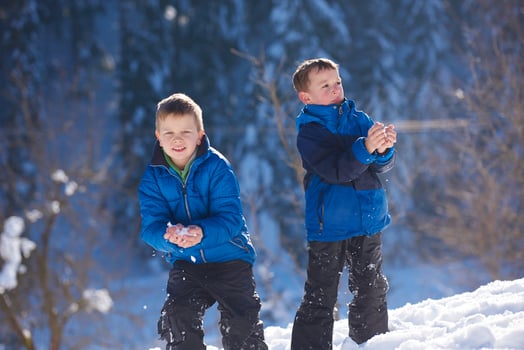 kids playing with  fresh snow photo