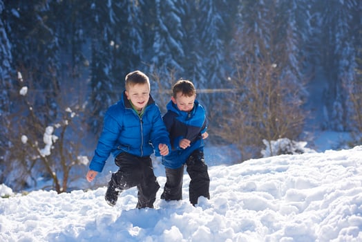 kids playing with  fresh snow photo