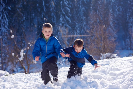 kids playing with  fresh snow photo
