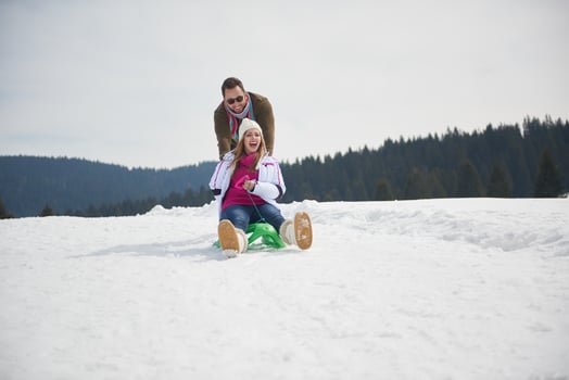 happy young couple having fun on fresh show on winter vacation photo