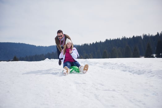happy young couple having fun on fresh show on winter vacation photo