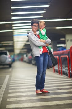 mother with baby in shopping photo