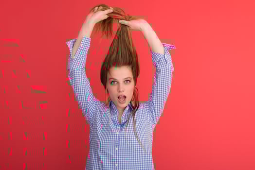woman playing with her long silky hair photo